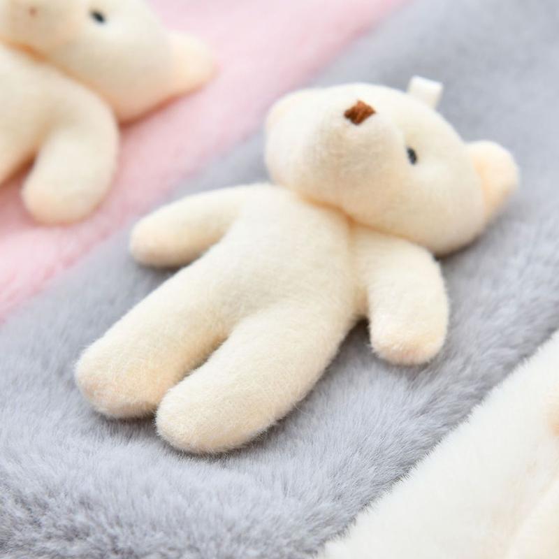 Simpatico bavaglino in peluche per adulti e bambini